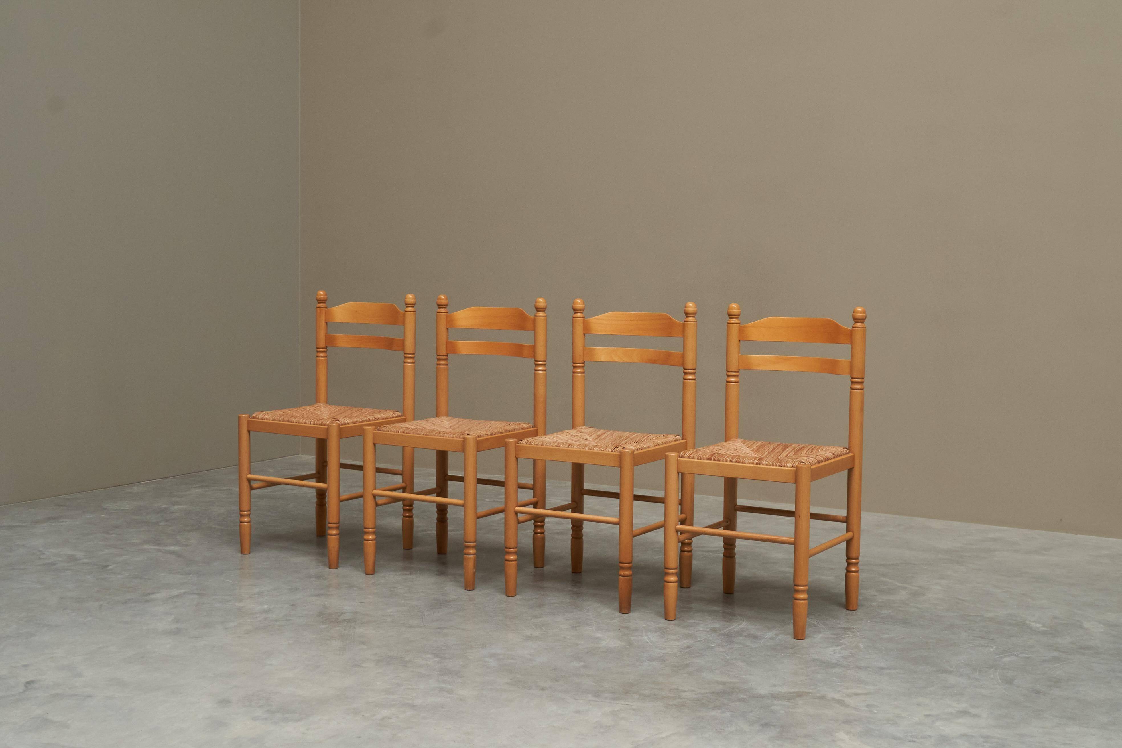 Set of 4 Mid Century beech dining chairs from the 1970s.