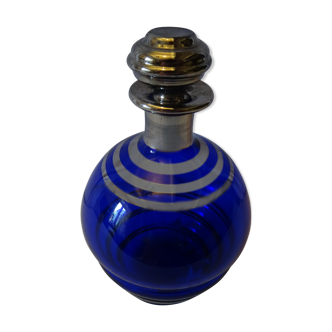 Royal blue and silver striped bottle