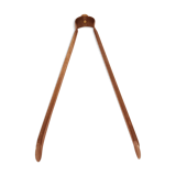 Old bronze or brass fireplace clamp