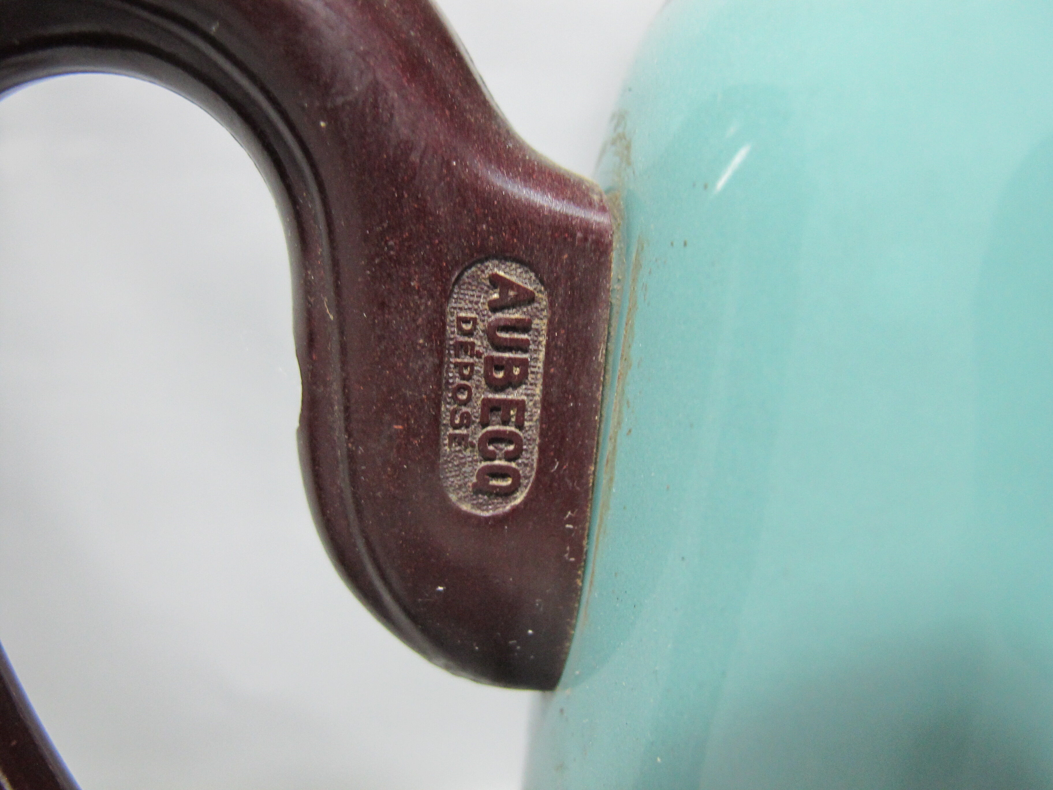 large vintage coffee maker made of enamelled sheet metal