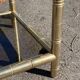 Square faux bamboo pedestal table in gold-plated brass and glass