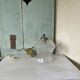 Glass and brass suspension