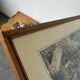 Framed old photo of a mountain landscape.