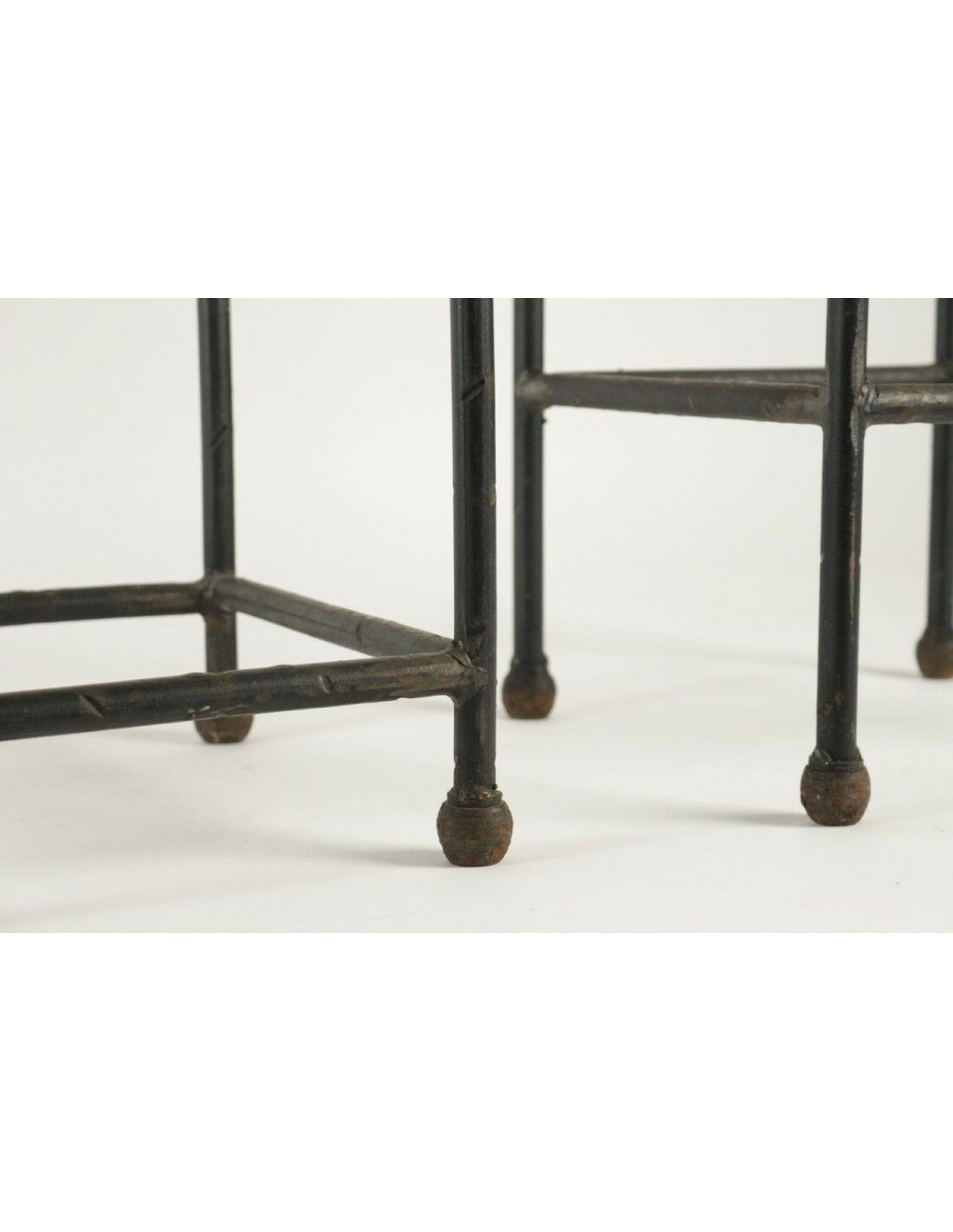 Two consoles, wrought iron sheaths on glass top, twentieth century