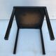 Old black metal and majolica tiles table