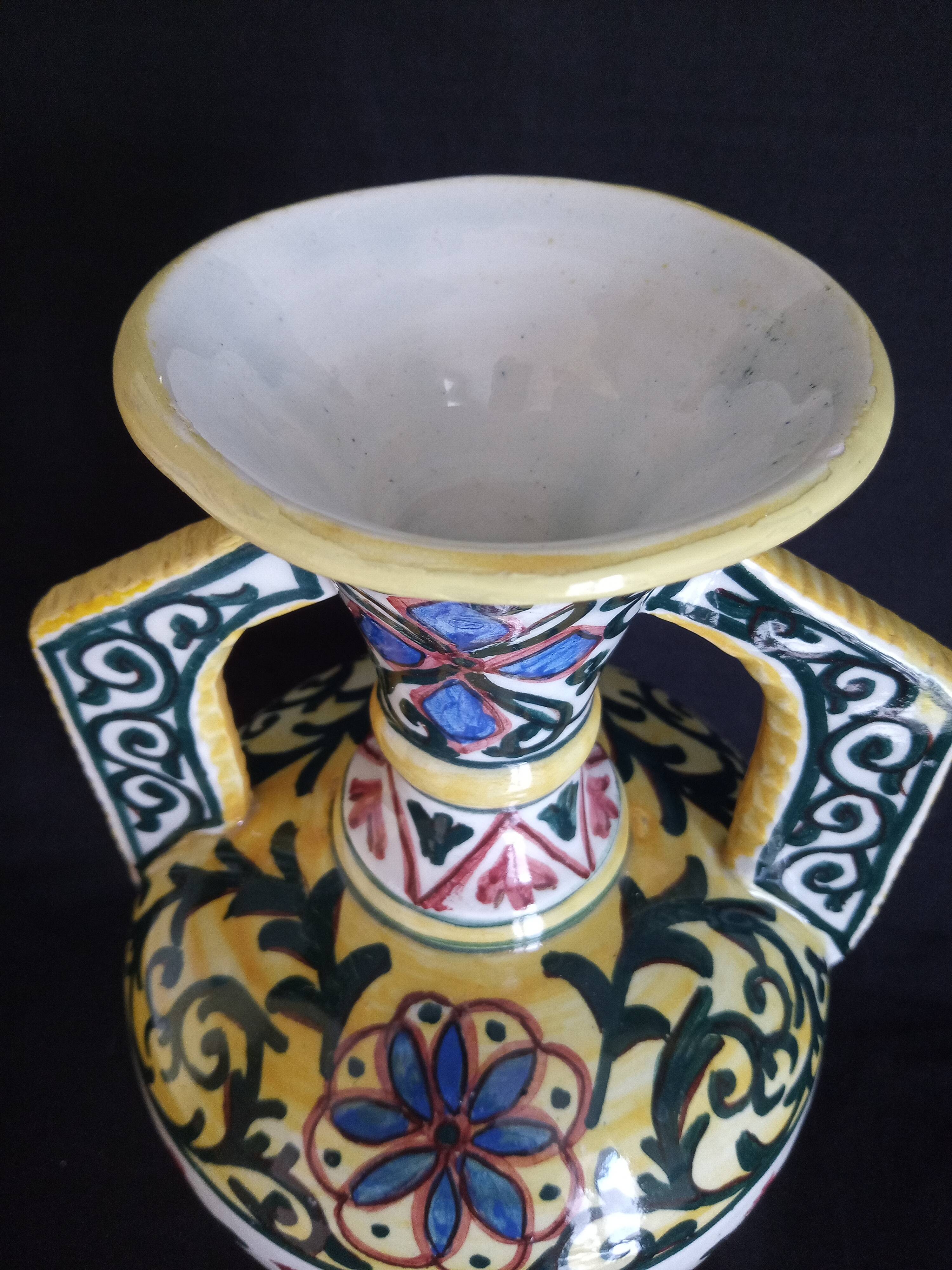 Art Deco ceramic vase with brightly colored abstract patterns