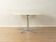 Extendable butterfly dining table, 1970s Space Age style