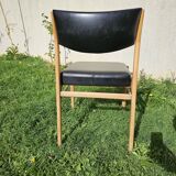 Scandinavian chair with faux leather seat and back