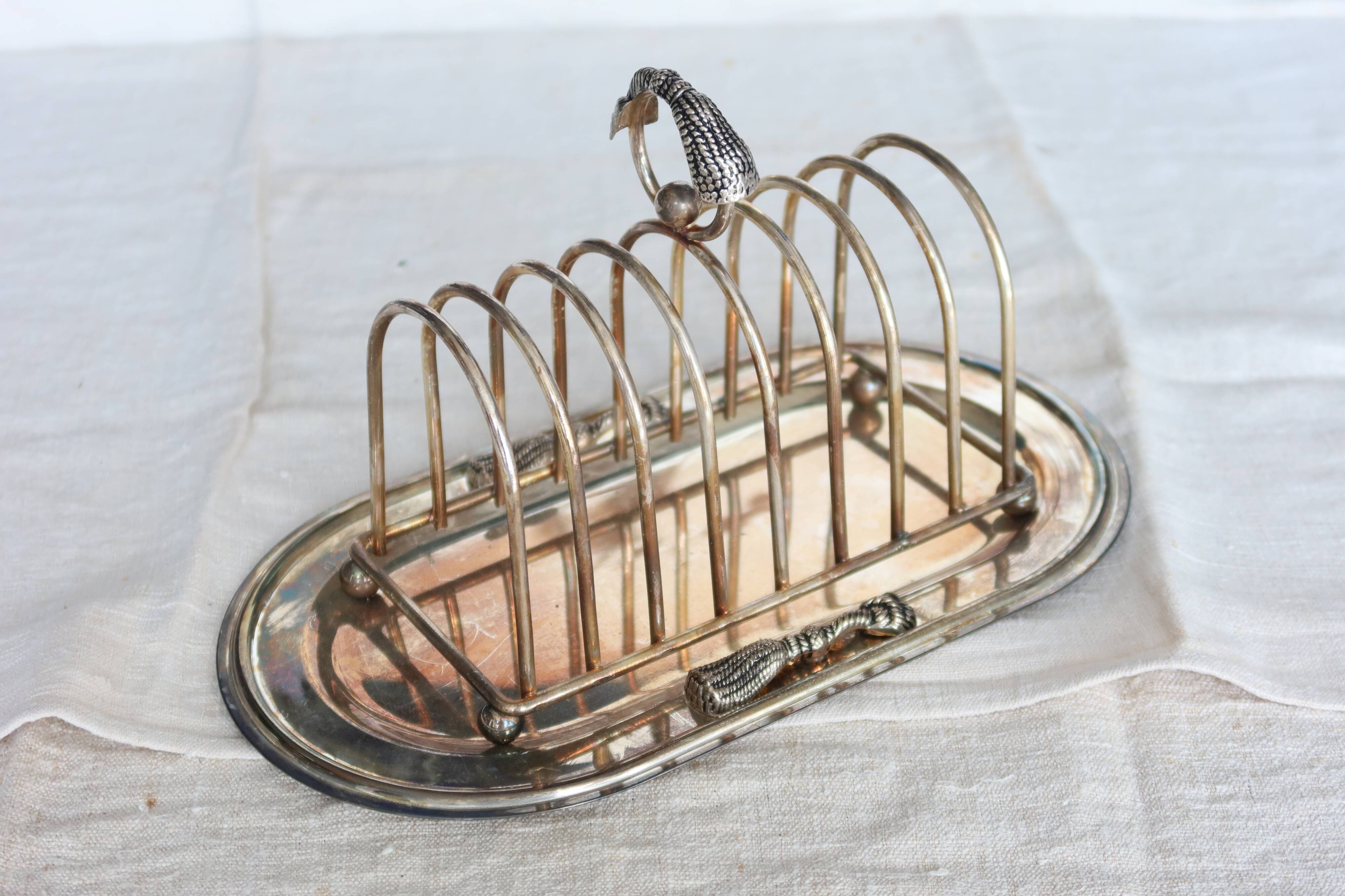 Large vintage silver metal toast rack - Curtain bow detail