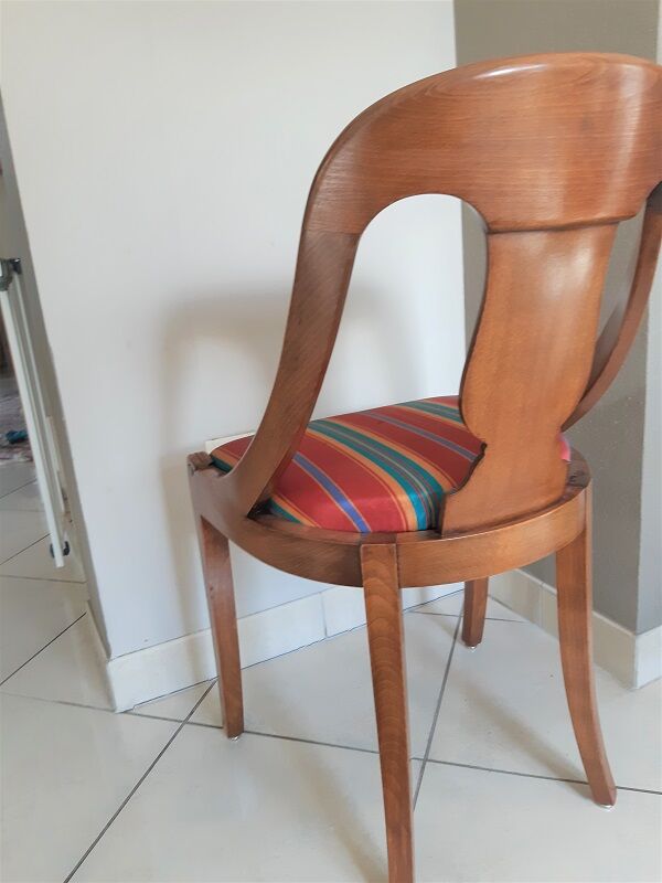 Gondola-style empire chairs