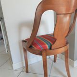 Gondola-style empire chairs