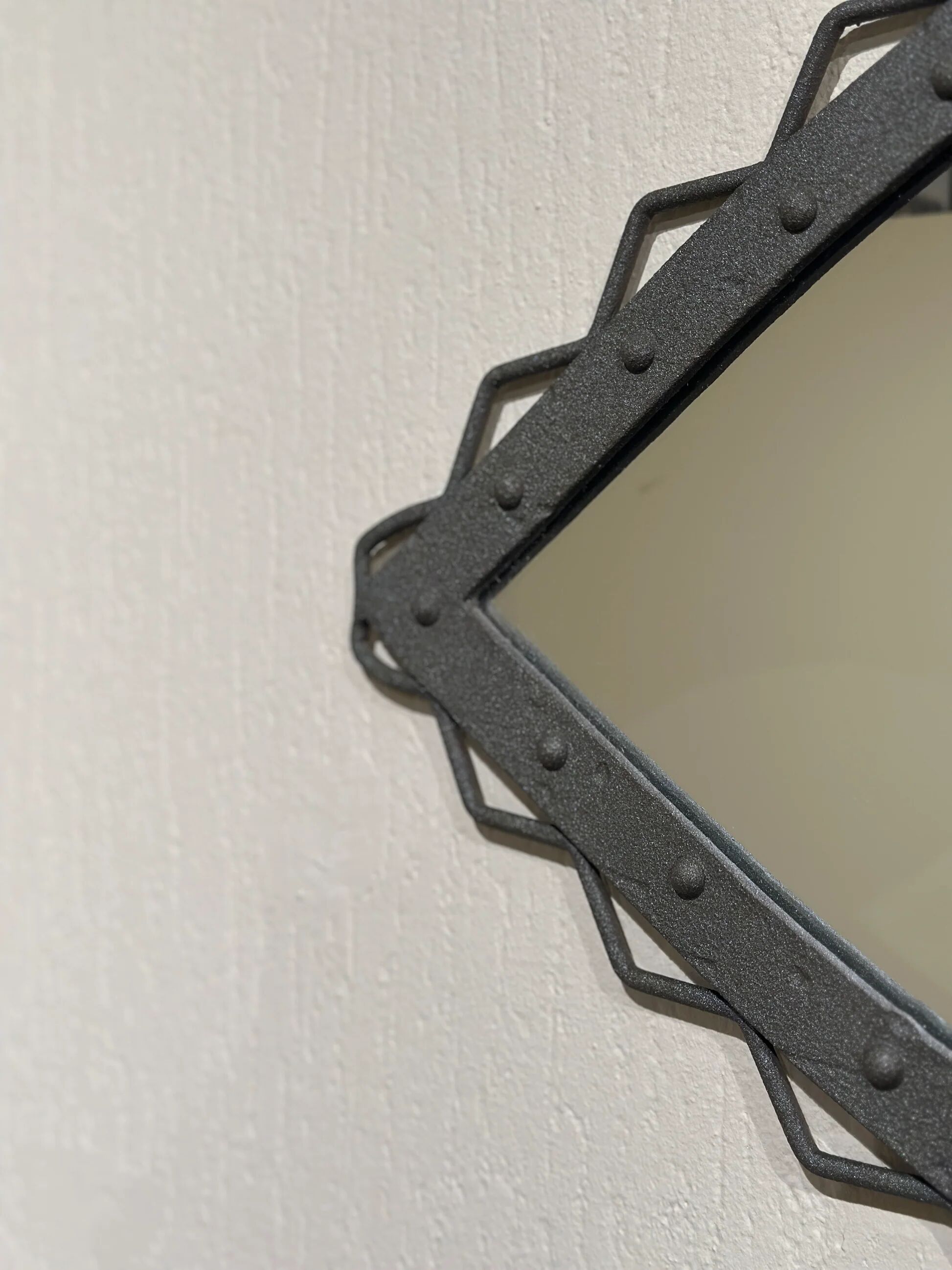 Hand-forged iron mirror with riveted frame, Italy, 1960s