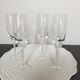 Four crystal champagne flutes engraved wheat cob patterns