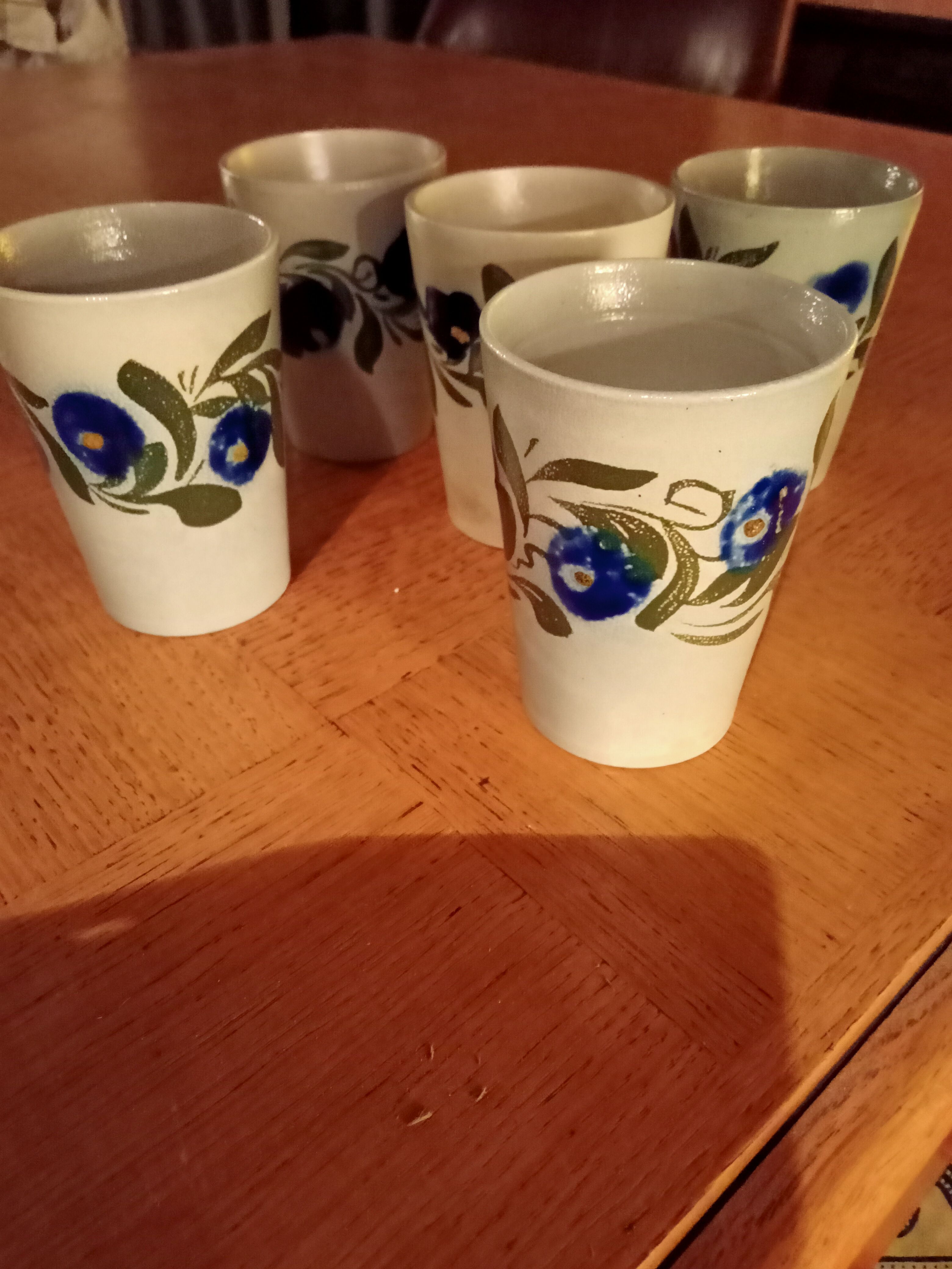 Set of five sandstone mugs