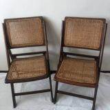 Pair of folding chairs in cane and dark wood