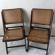 Pair of folding chairs in cane and dark wood