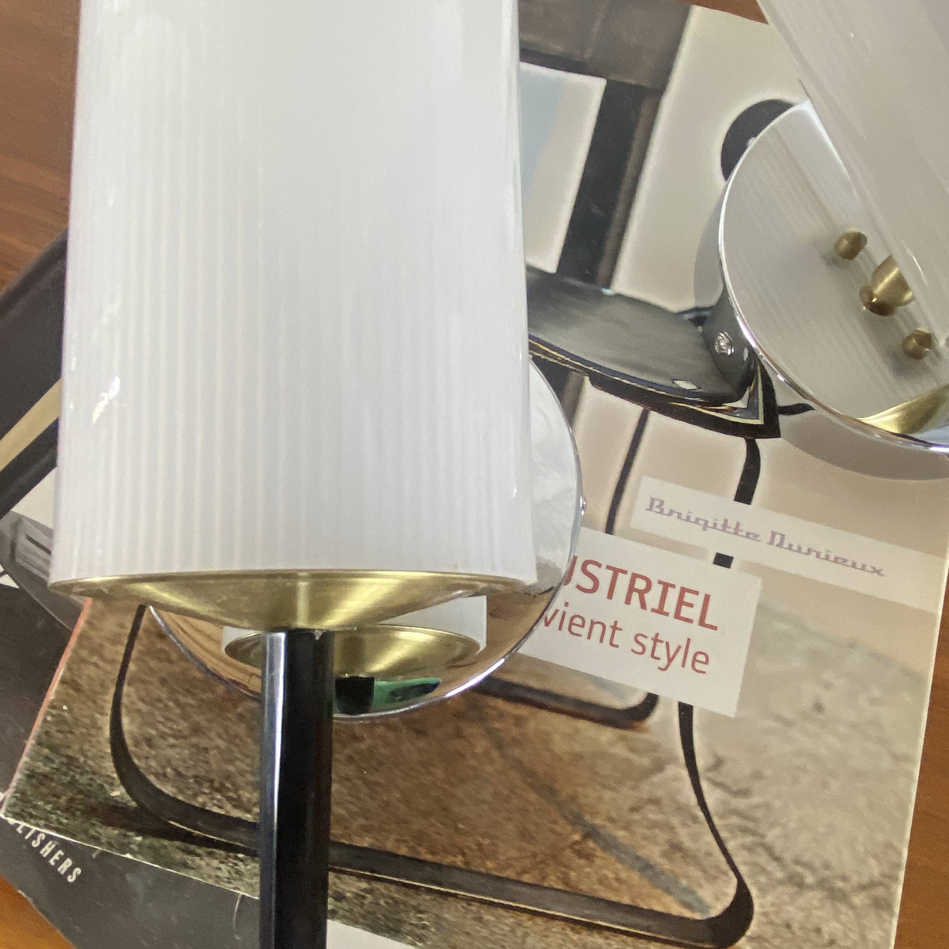 Pair of vintage wall sconces in plexiglass plastic and brass.