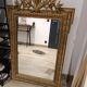 Antique mirror in Napoléon III style with a laurel pediment.