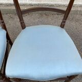 2 Napoleon III chairs in solid wood and blue satin fabric.