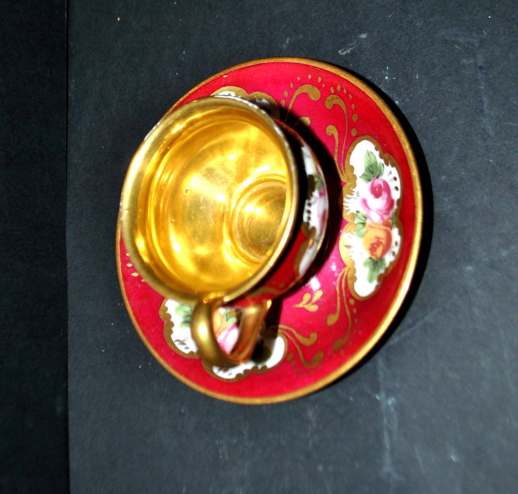 Limoges precious porcelain cup decorated in fuchsia pink and gold, signed MAB