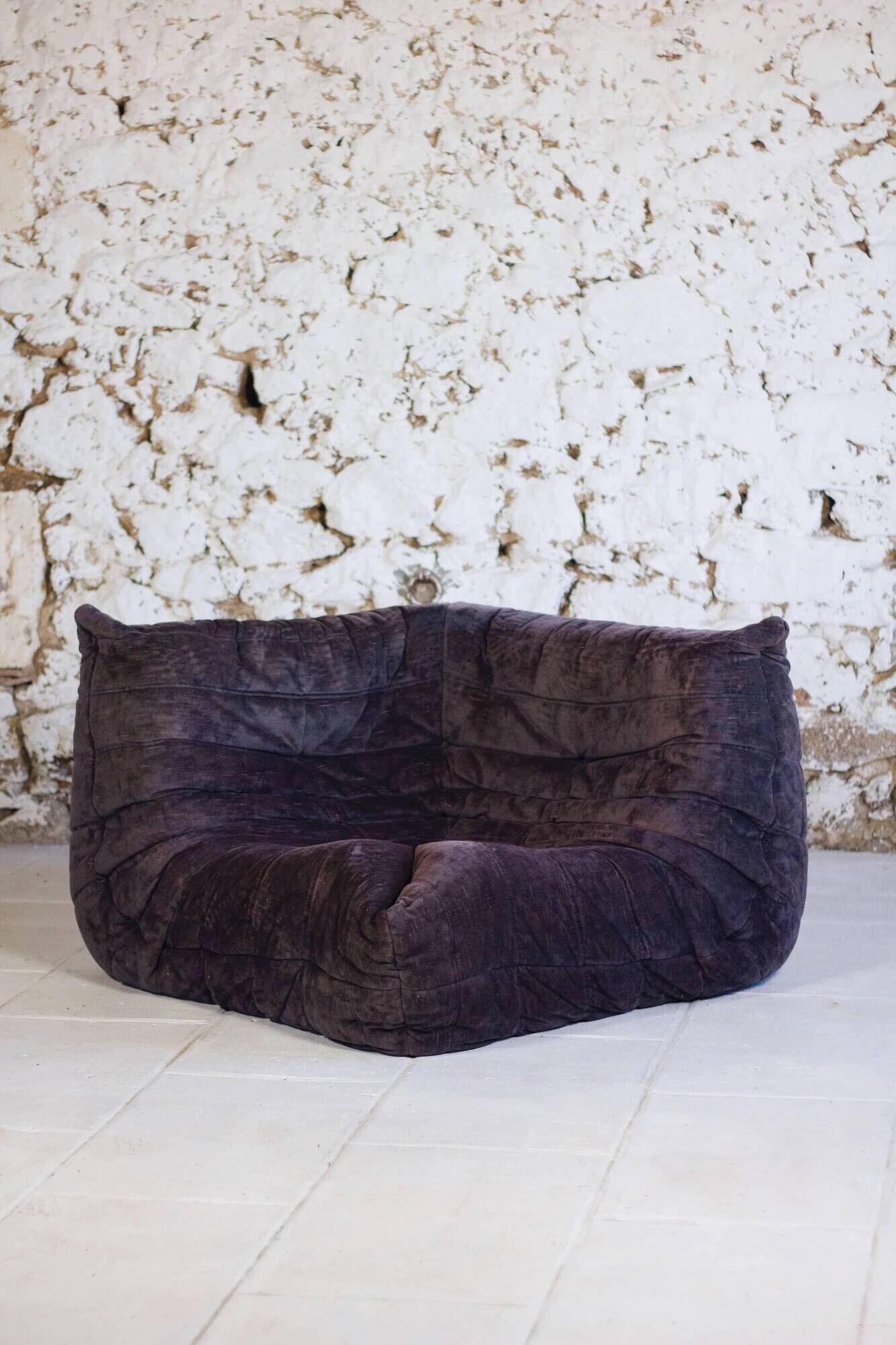 Togo aubergine corner armchair by Michel Ducaroy for Ligne Roset