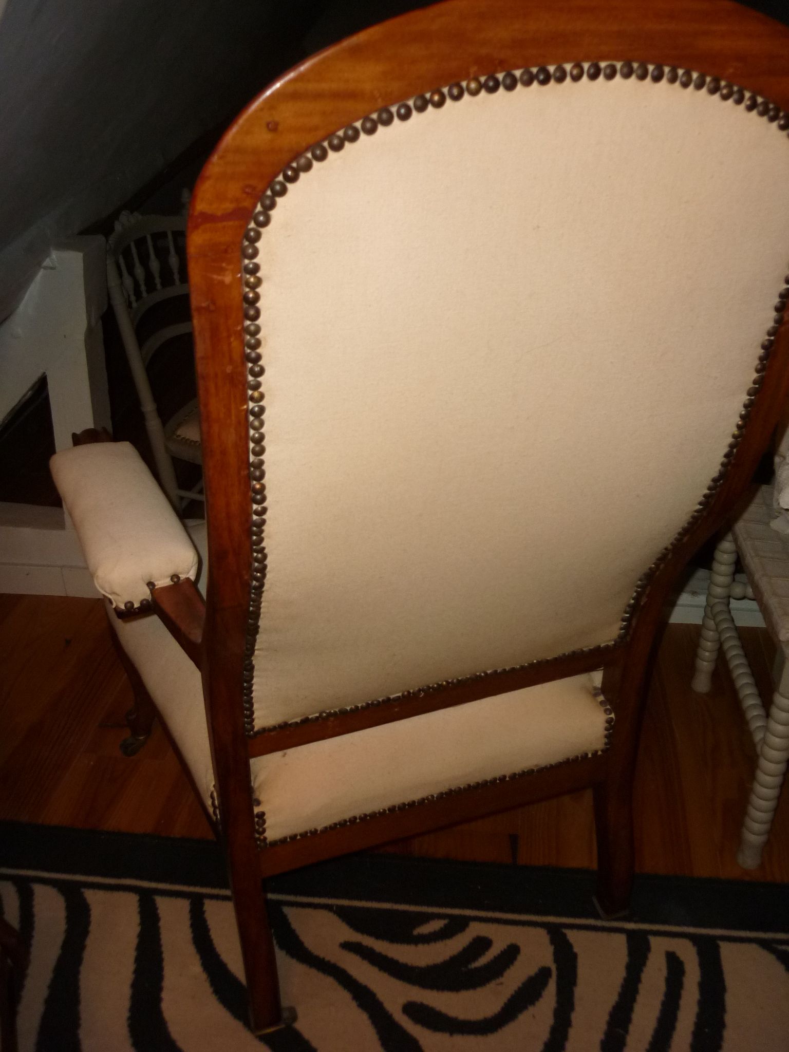 Armchair and its footrest