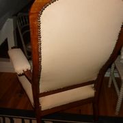 Armchair and its footrest