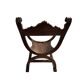 Fauteuil dit Dagobert en bois sculpté vers 1900