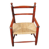 Old straw armchair for children