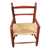 Old straw armchair for children