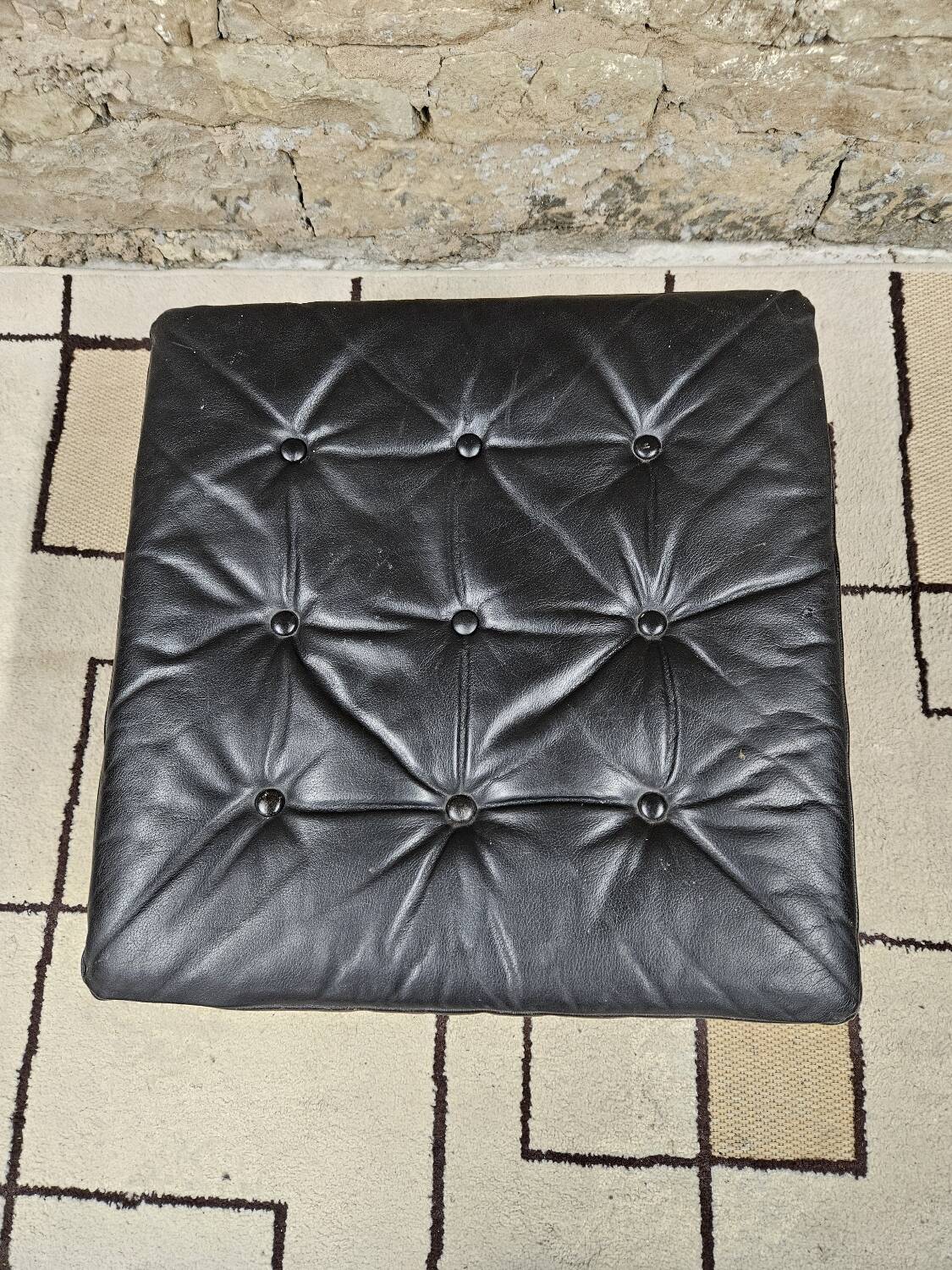 Black leather ottoman 1970 vintage