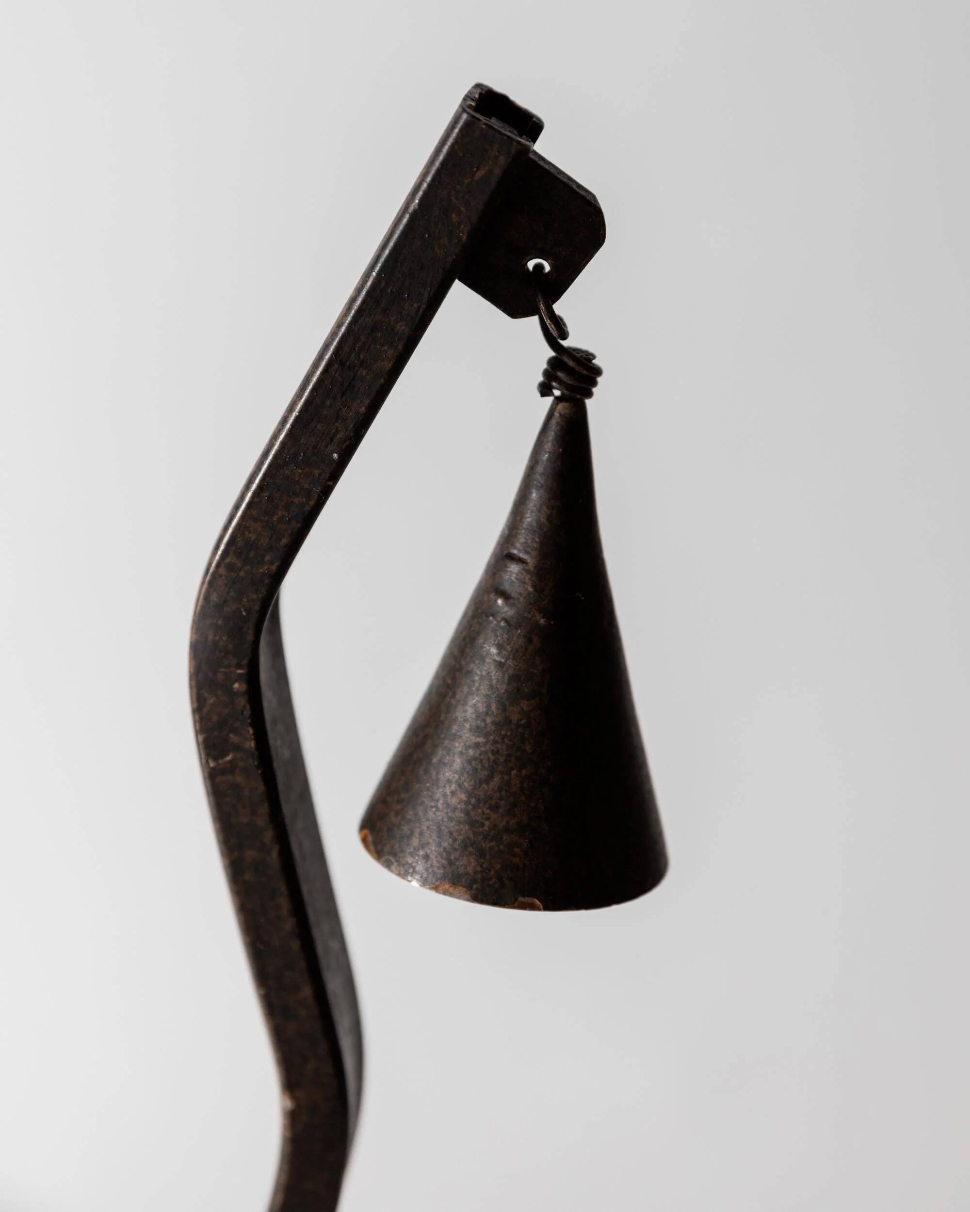 Vintage wrought iron candlestick from the 1960s, zigzag design with removable snuffer.