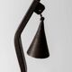 Vintage wrought iron candlestick from the 1960s, zigzag design with removable snuffer.