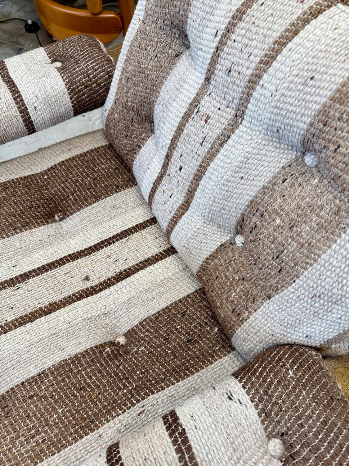 2 vintage 1970s wooden and fabric armchairs