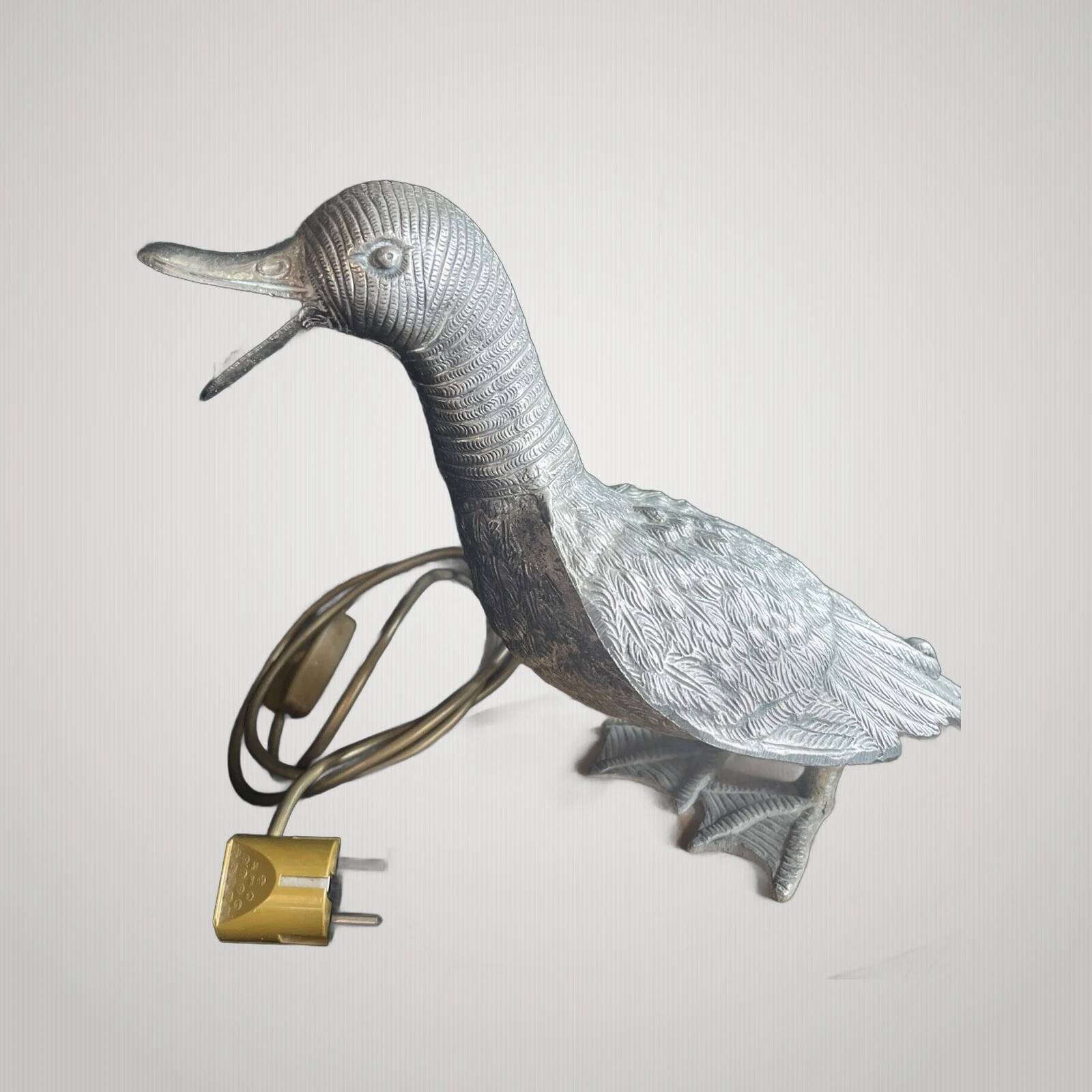 Lampe canard en bronze argenté Maison Charles, début 20e
