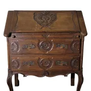 Antique solid wood secretary richly carved, in the Louis XV style.