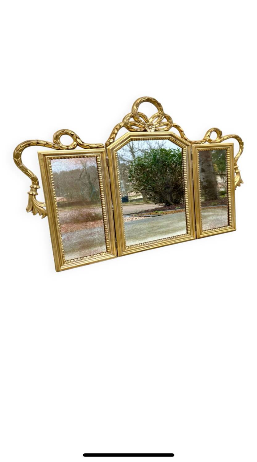 Miroir triptyque en bois doré et sculpté