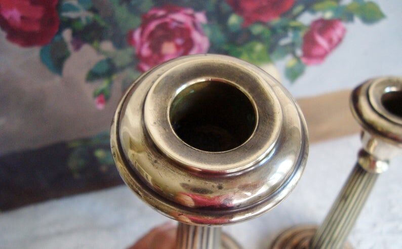 Pair of very old brass candlesticks