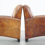 Set of 2 stylish yet comfortable armchairs made of sheepskin leather with a sleek design