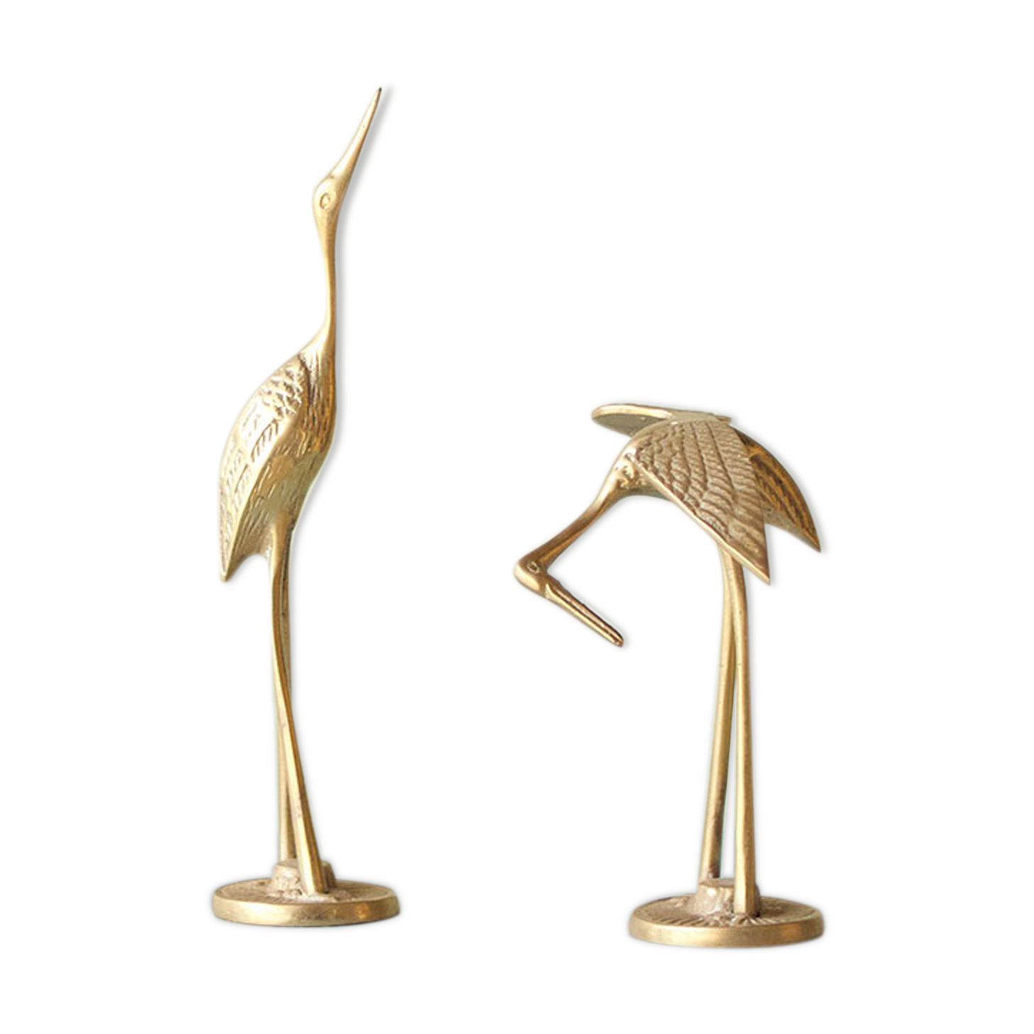 Pair of herons in brass