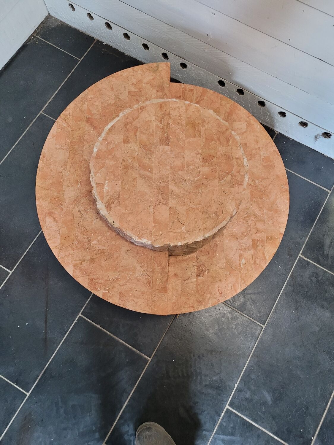 Round stone coffee table by Magnussen Ponte