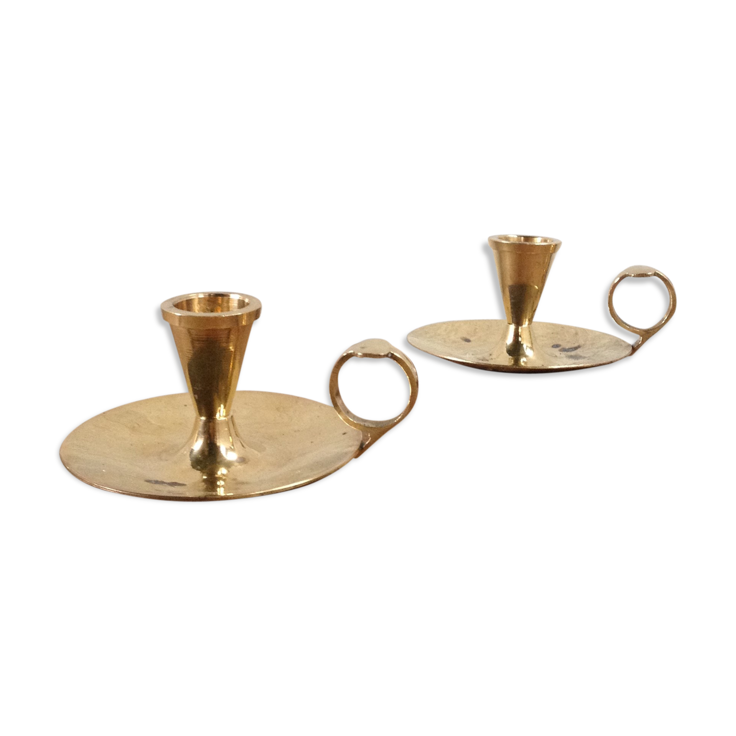 Pair of brass cellar rat candlesticks