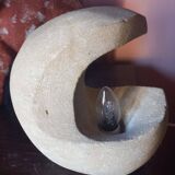 Sculpted stone lamp from the 1970s, signed.