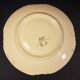 4 Quimper earthenware saucers or plates