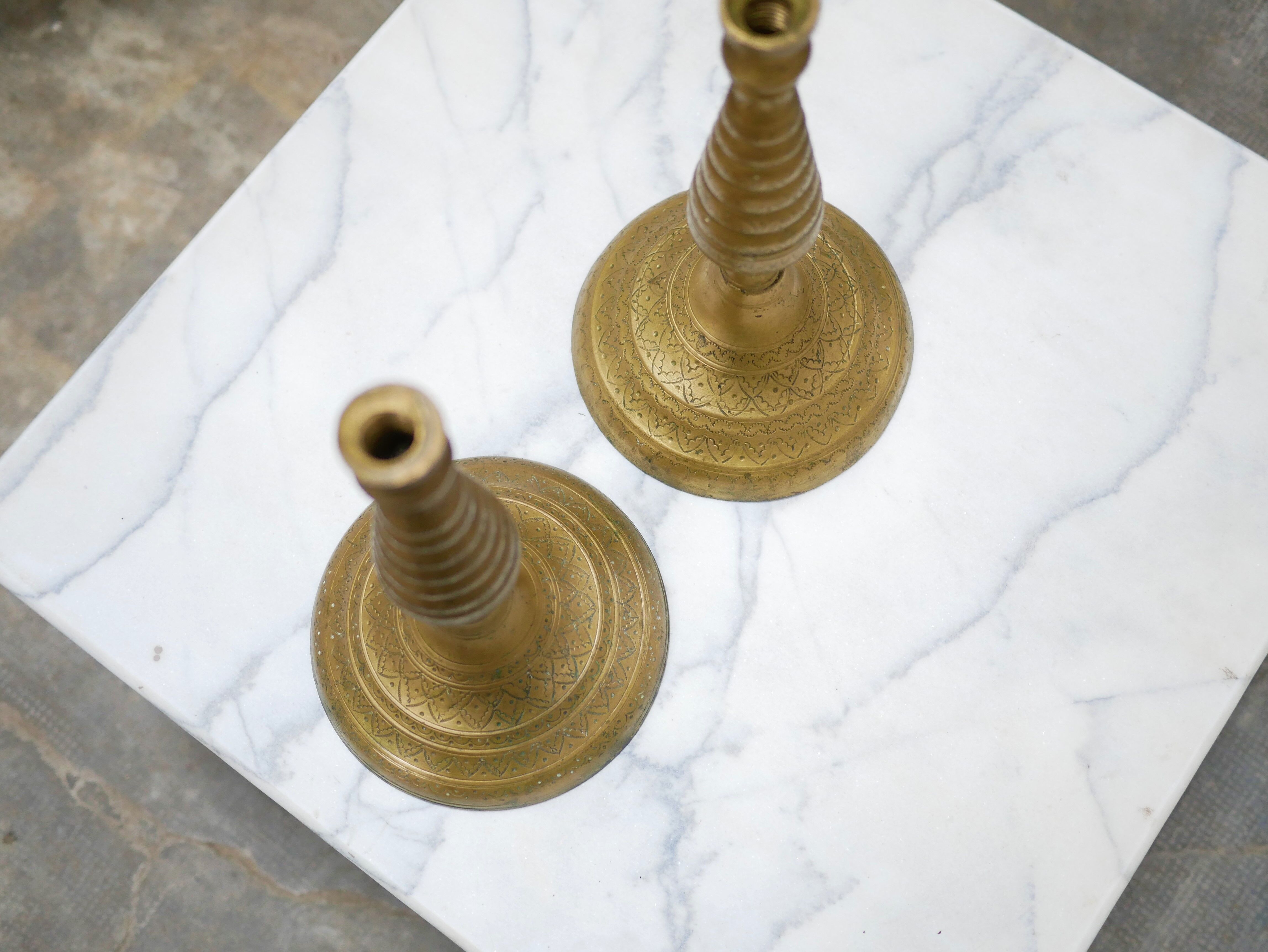 Pair of vintage candle holders in golden brass