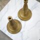 Pair of vintage candle holders in golden brass