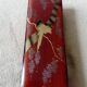 Glove box in lacquered wood decorated with 2 birds under wisteria