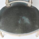 Pair of Louis XVI style convertible armchairs