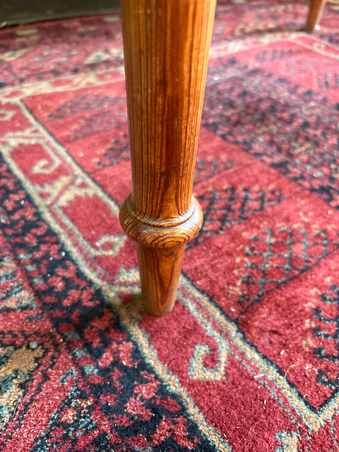 Small solid wood desk with a drawer.