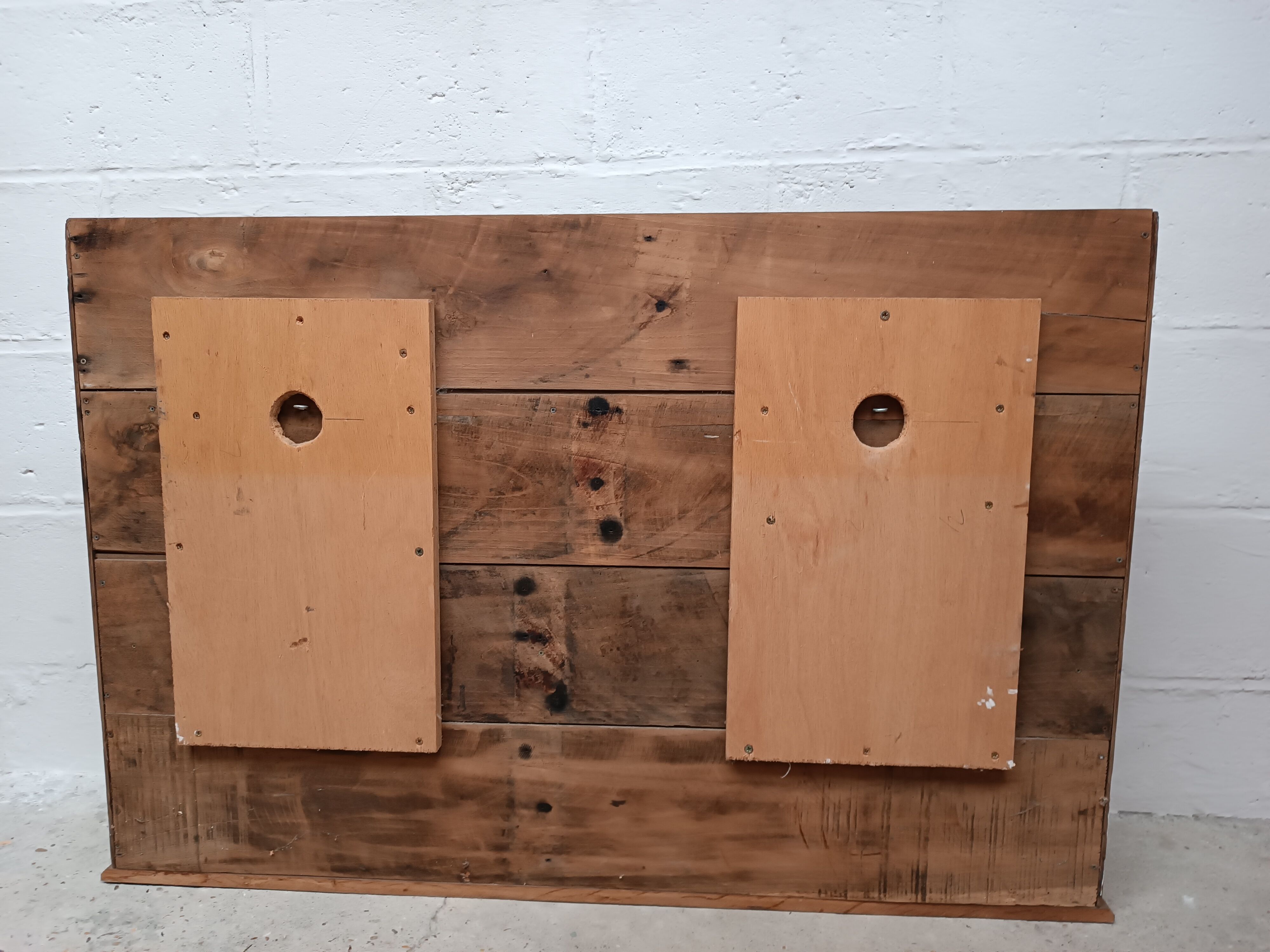 Old wall shelf in raw wood